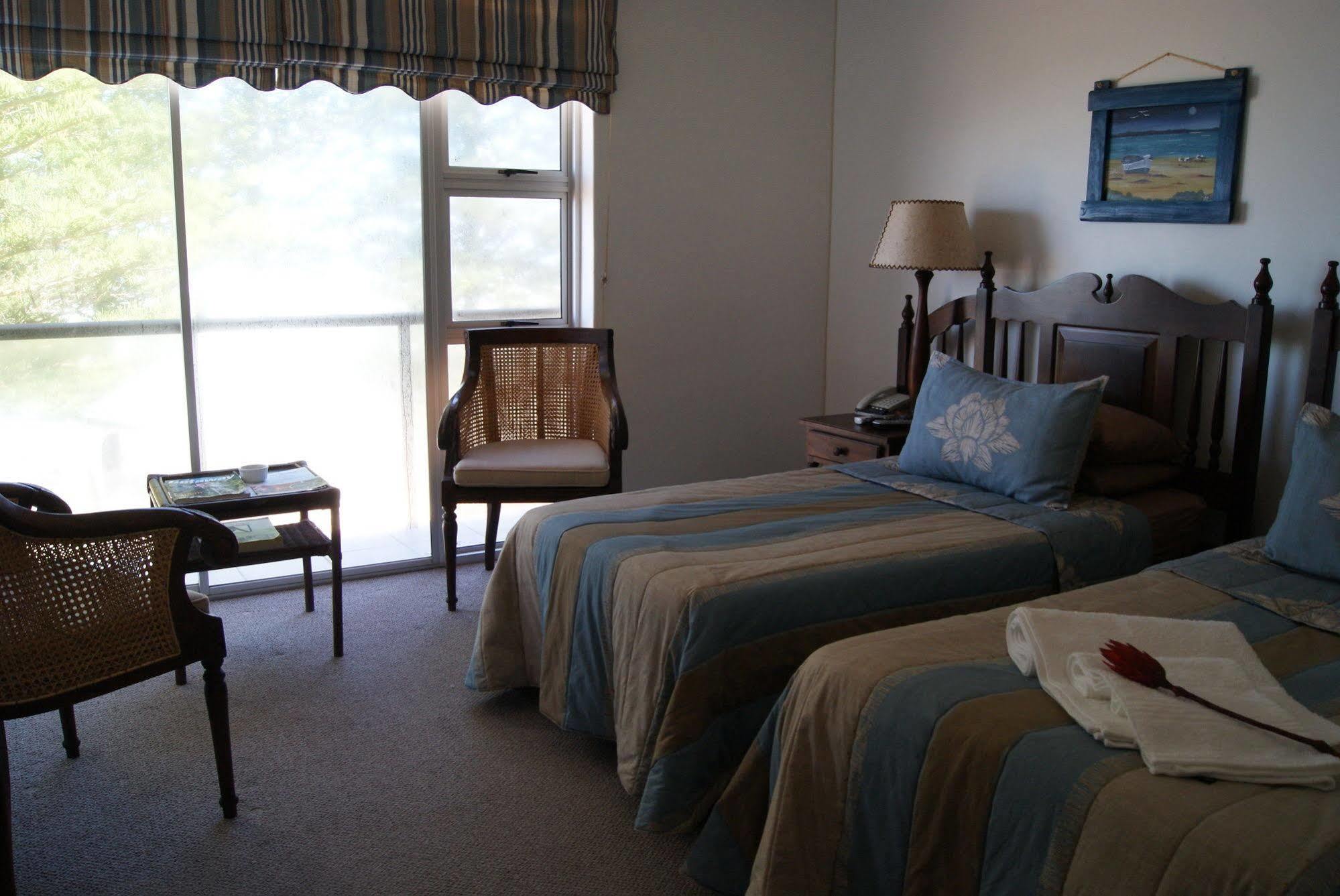 Sea Otters Lodge Kini Bay Bagian luar foto