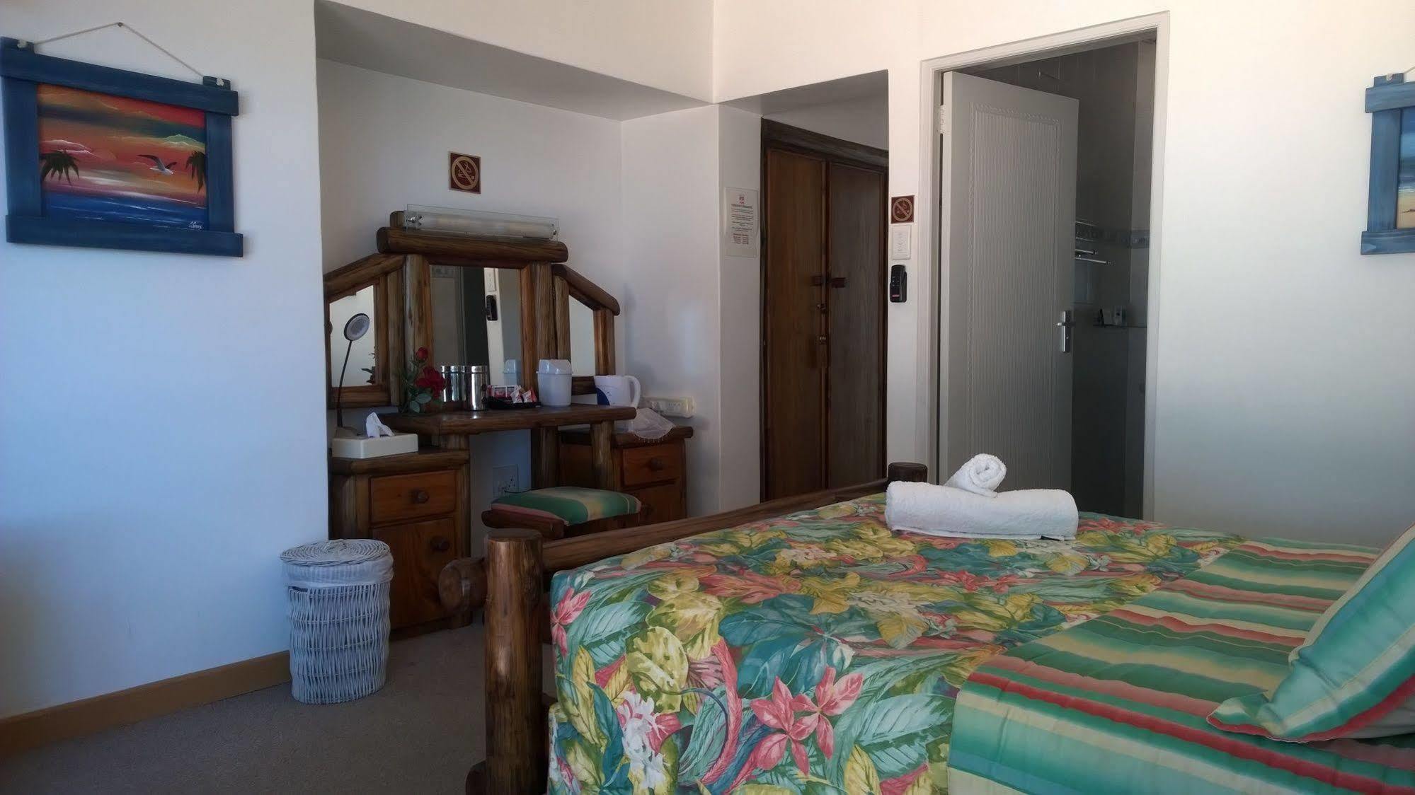 Sea Otters Lodge Kini Bay Bagian luar foto